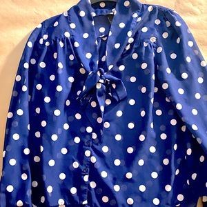 Navy and white polka dot blouse with front tie